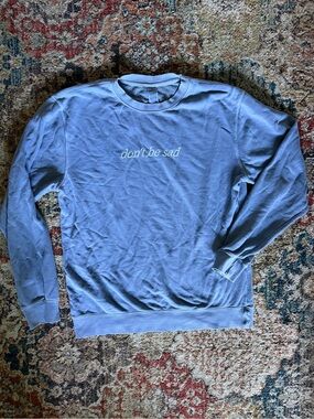 Light Blue Crewneck Sweatshirt with "don't be sad" Chest Print
